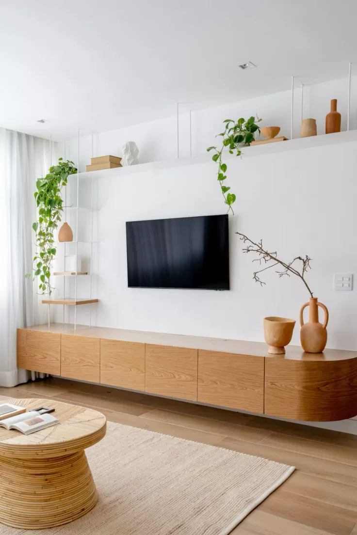 Este móvel virou tendência e faz sua sala parecer maior em segundos 6 rack curvo suspenso 2
